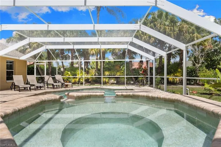 38 ft long heated pool and spa with the convenience of a screen enclosure