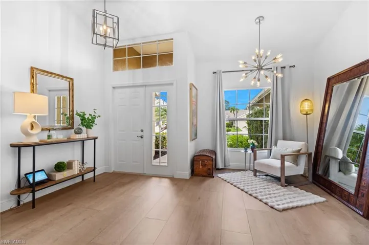 Entrance, foyer and den or reading nook