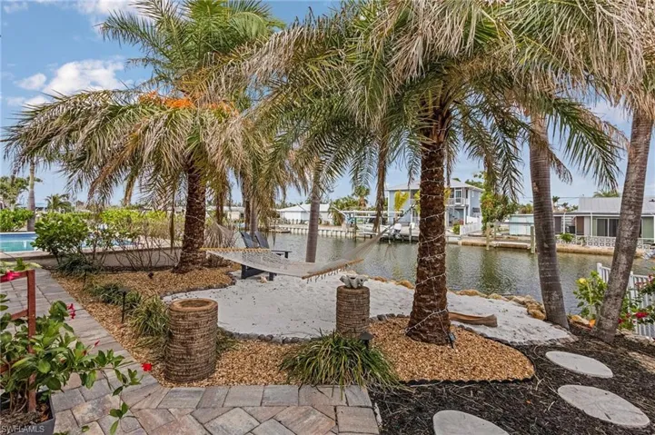 There is even a sandy beach complete with a hammock to relax the day away!