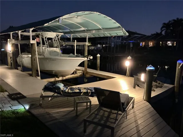 Dock area featuring boat lift