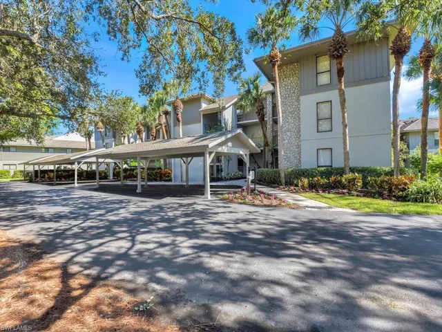 First Floor End Unit Condo w/ Covered Parking