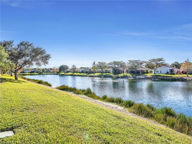 Water view featuring nearby suburban area