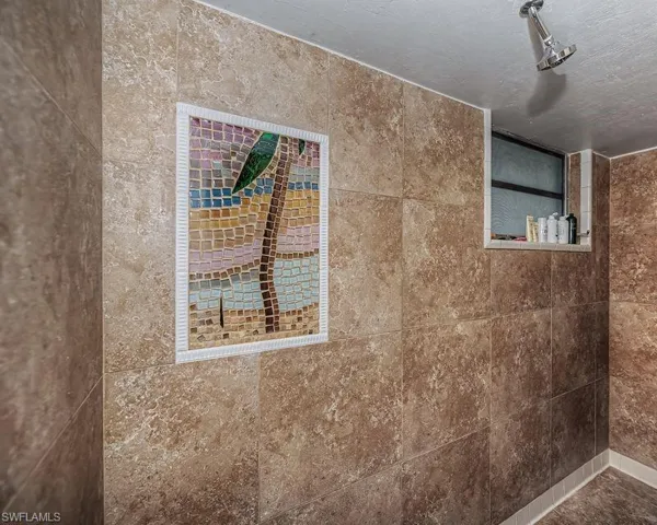 Master bath walk in shower with mosiac accent