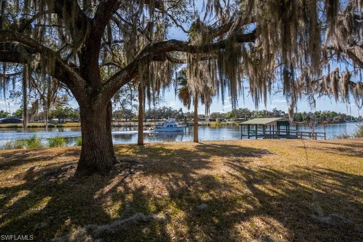Water view featuring a dock