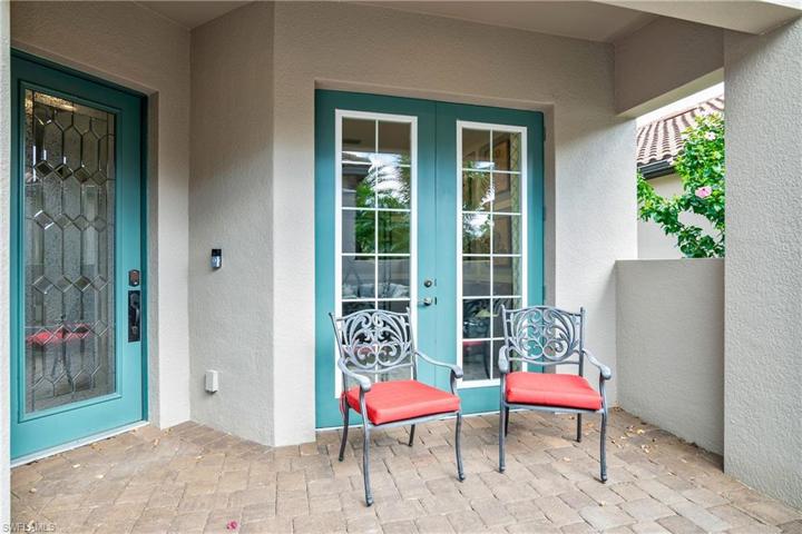 Double french doors provide easy access to your den/home office.
