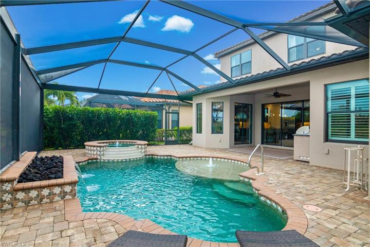 You'll love the custom tile work and gas flame feature which make this pool so unique.