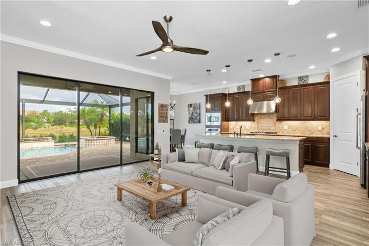 You'll LOVE this open floor plan which features and open great room, oversize island, eat-in breakfast cafe, and even a formal dining room just off the kitchen! (photo digitally staged)