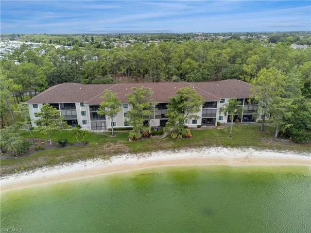 Birds eye view of property with a view of the Lake