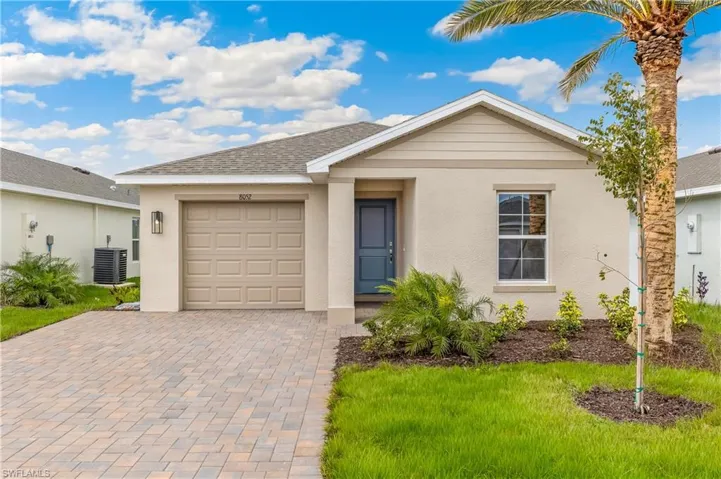 Model - Single-story residence featuring a stucco exterior with decorative gables