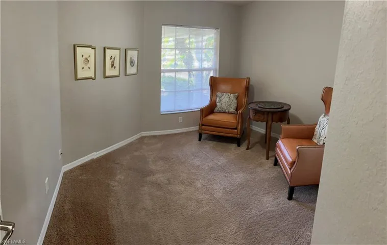 Sitting room with carpet floors
