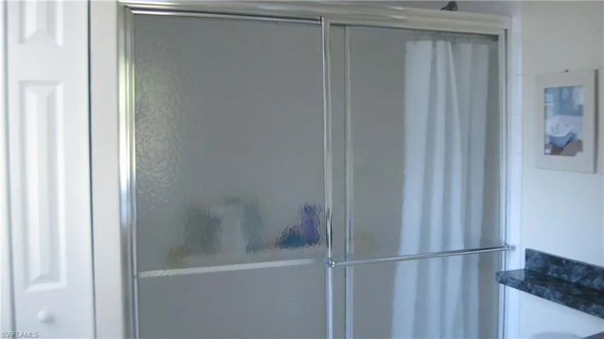 Bathroom view of a stall shower
