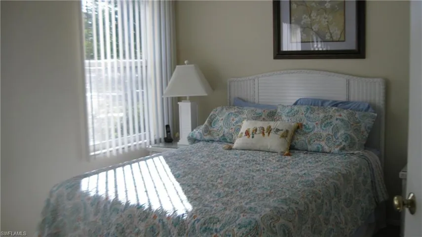 View of guest bedroom, lots of natural light.