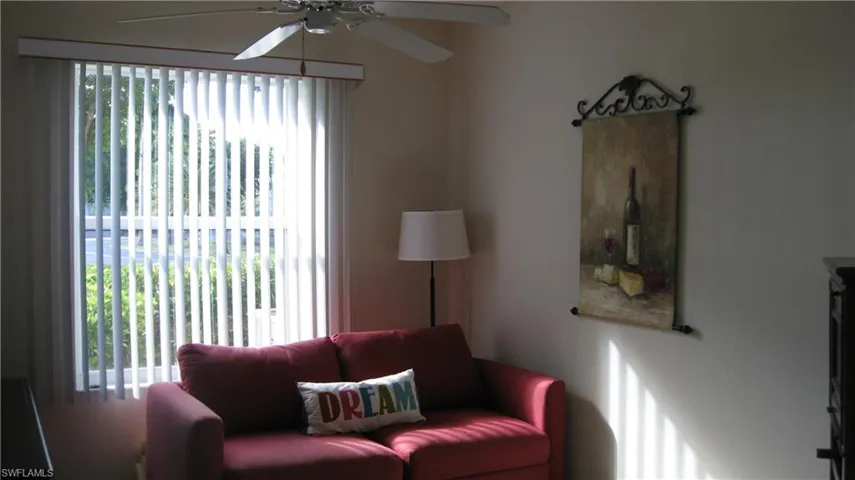 Sitting room featuring a ceiling fan, easily converted to a bedroom