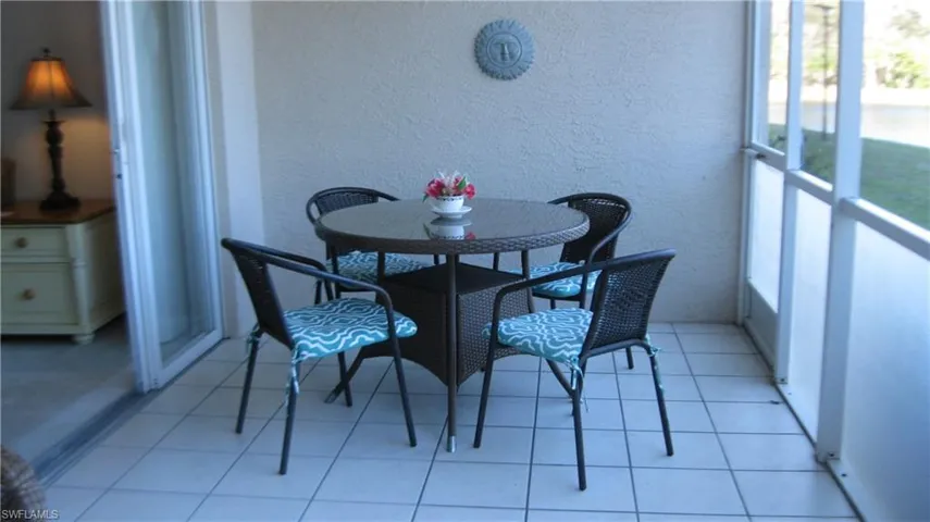 Super large lanai with plenty of room for outdoor living. View of the lake and sunrises.