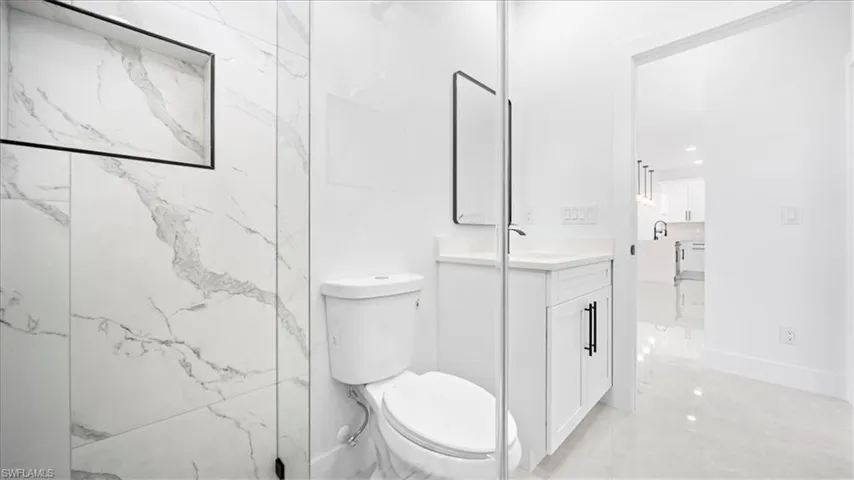 Bathroom with toilet and vanity