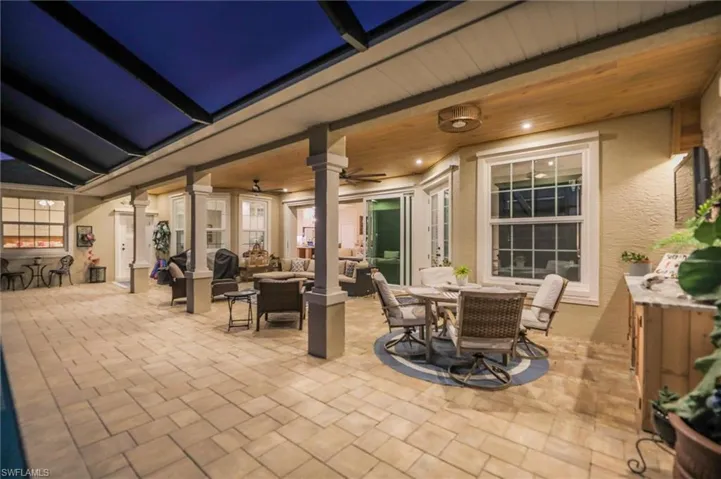 View of patio / terrace featuring outdoor dining space, outdoor lounge area, ceiling fan, and area for grilling