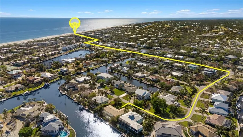 Aerial view of residential area with a nearby body of water