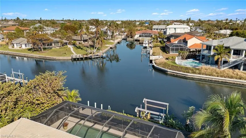 Aerial view of residential area with a nearby body of water