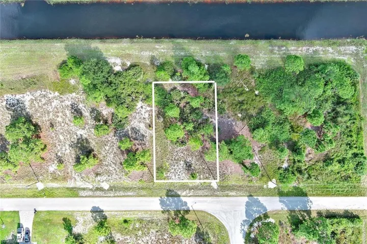 Aerial view of property's location with property parcel outlined