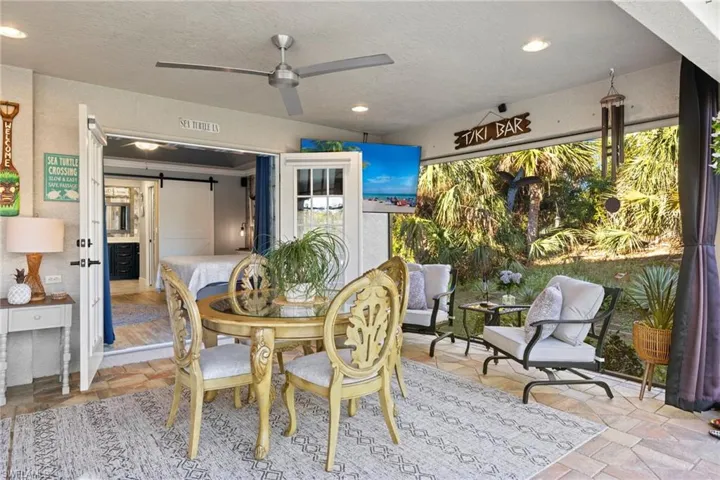 Outdoor dining with French doors to the Primary bedroom