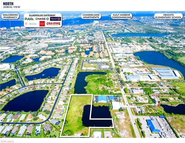 View of property location featuring property boundaries highlighted and a nearby body of water