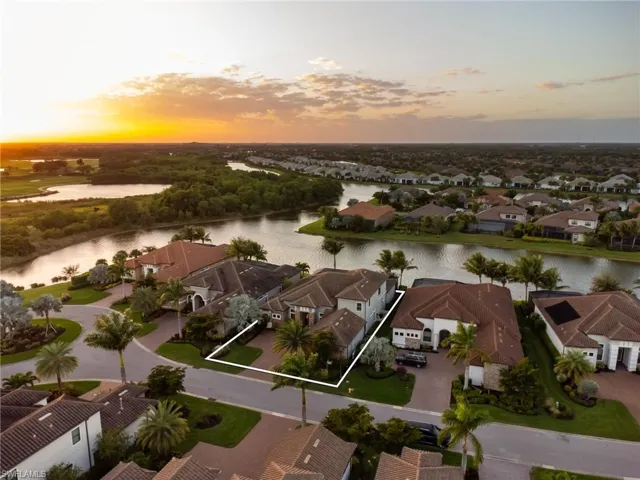 Aerial view of residential area with a large body of water