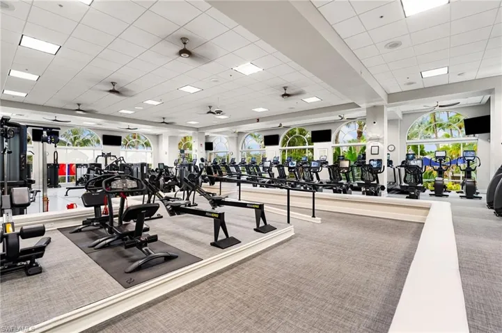 Workout area with a paneled ceiling