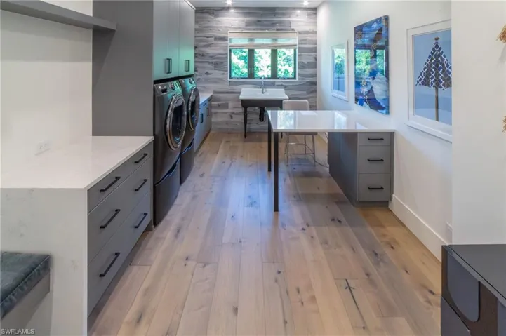 Utility area with plenty of room for laundry and hobbies