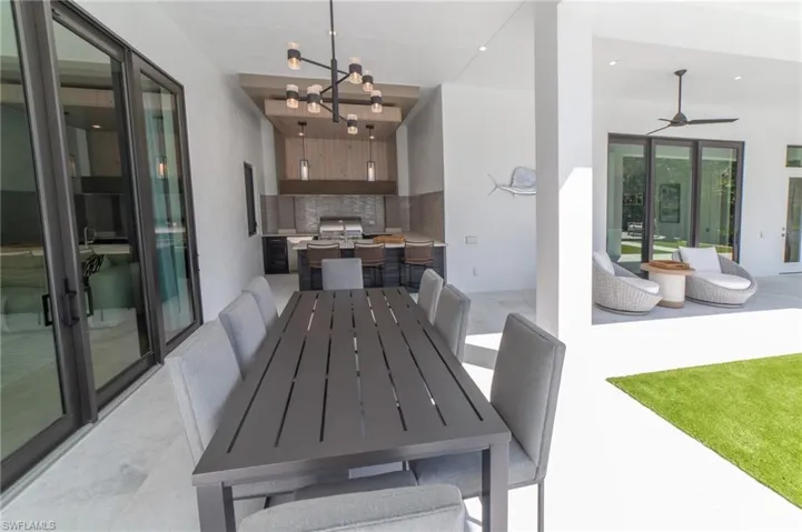 Outdoor dining overlooking the pool