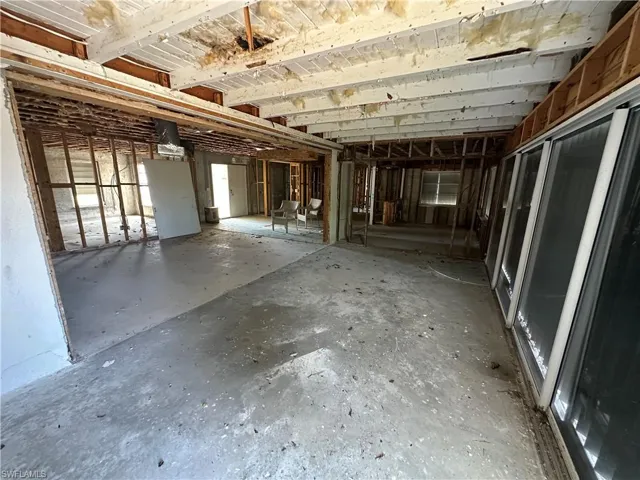 Unfinished lower level awaiting your personal touch - Virtually Edited Image