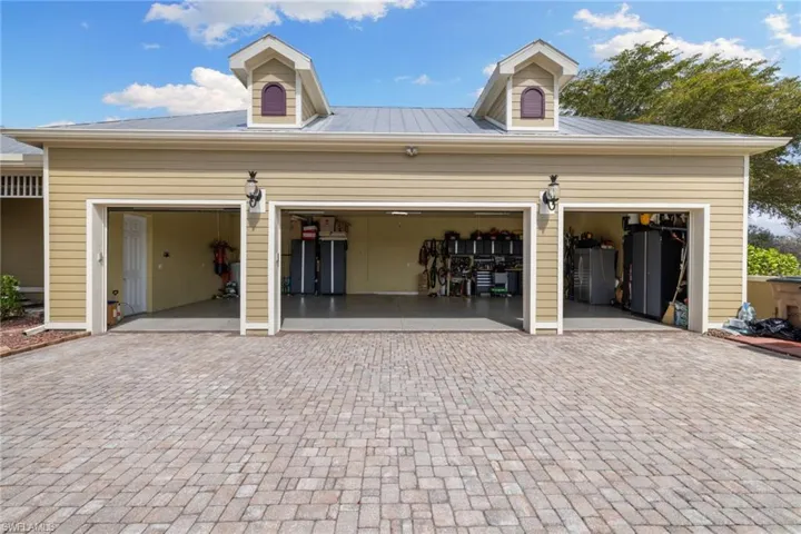 Garage featuring fridge