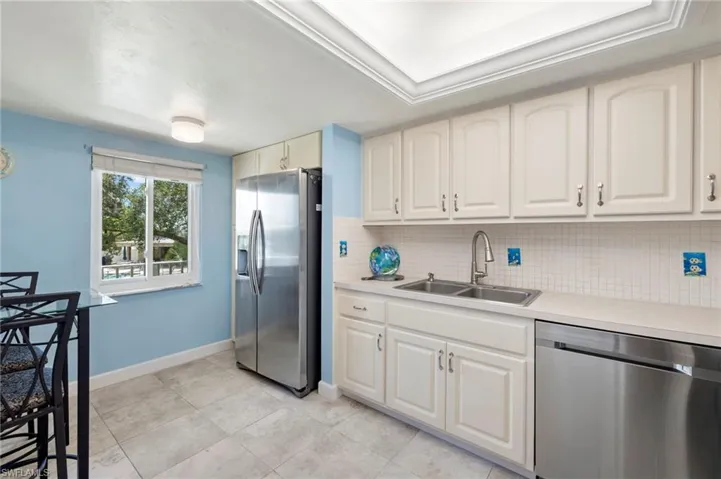 New Impact windows, New AC, New tile & carpet, HWH, W/D & more