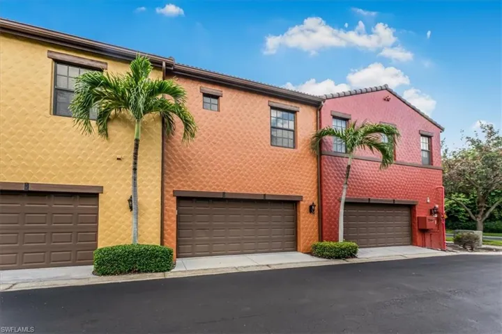 Mediterranean / spanish-style home with an attached garage and stucco siding