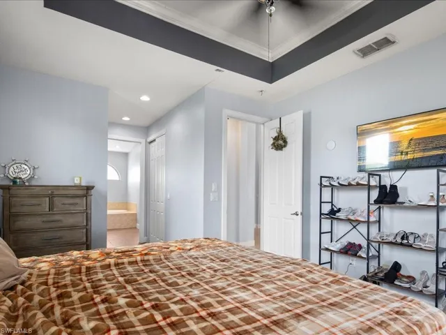 Bedroom with a closet and ensuite bathroom