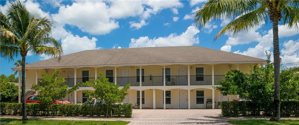 View of front of house with a balcony
