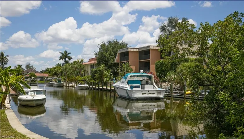 View of water feature featuring a dock