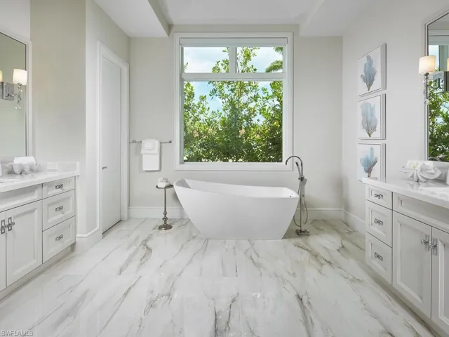 Bathroom with tile flooring and vanity
