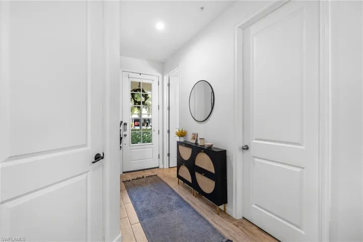 Doorway to outside featuring wood finished floors