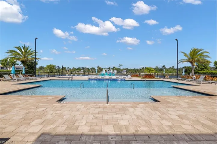 Community pool featuring a patio area