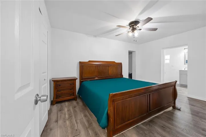Main Bedroom with a closet, wood finished floors, and ceiling fan