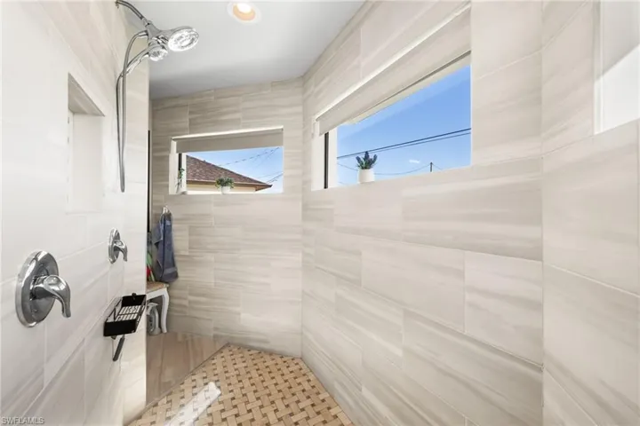 Bathroom with a tile shower