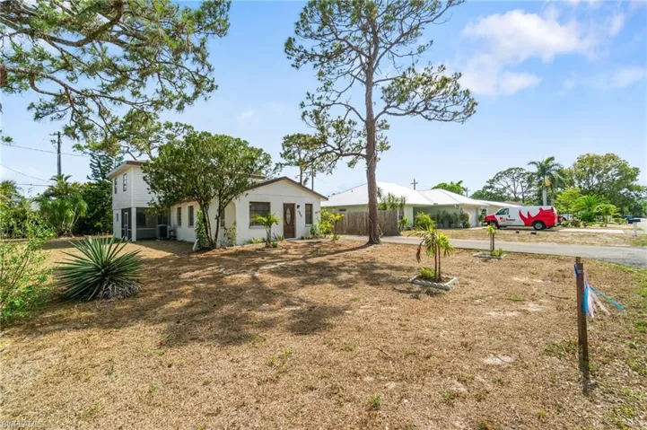 View of yard featuring fence