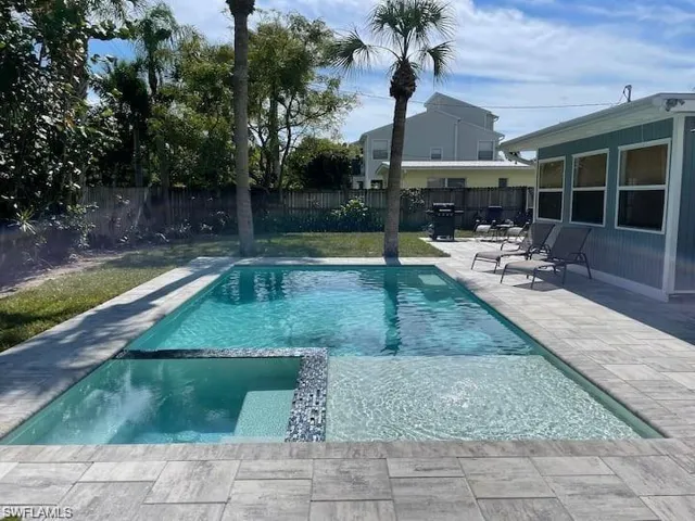 View of swimming pool featuring a patio