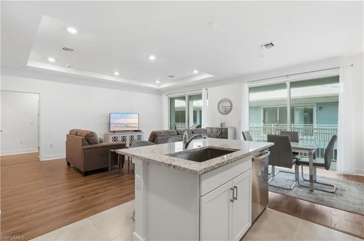 The living and dining area opens to a private lanai.
