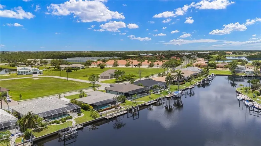 Aerial view of residential area with a large body of water