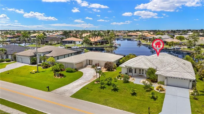 Aerial view of residential area with a large body of water