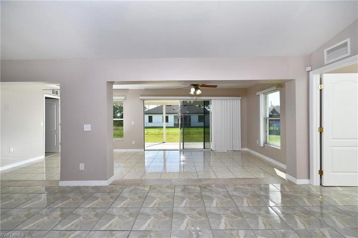 Large back family room. Bonus room next to it. Could be a extra bedroom or den.
