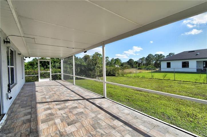 37x10 back screened porch with beautiful tile floors. 400 square feet with 2 doors. Elite pan roof ceiling.