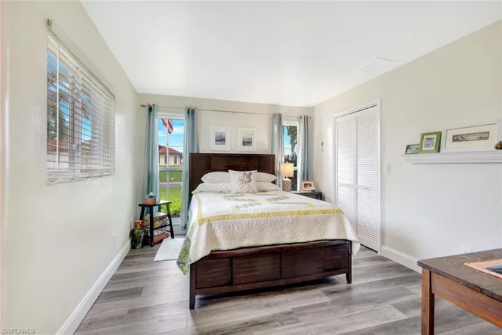 Bedroom featuring hardwood / wood-style flooring and a closet