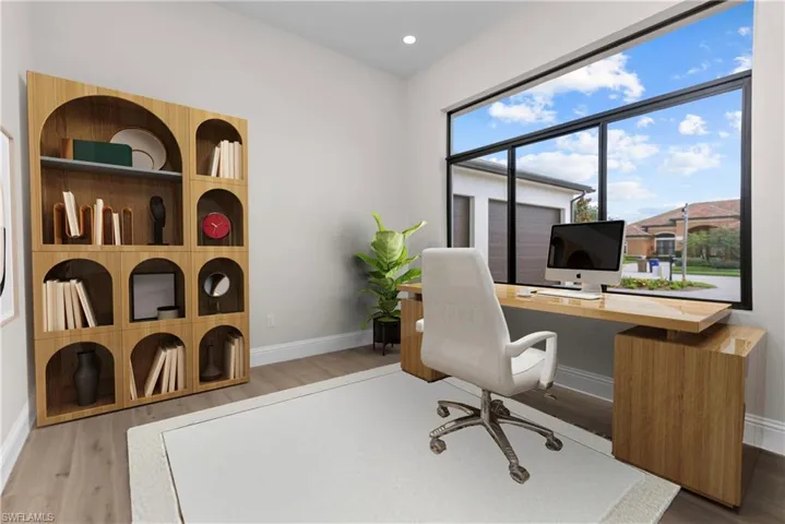 Office area featuring wood finished floors and recessed lighting